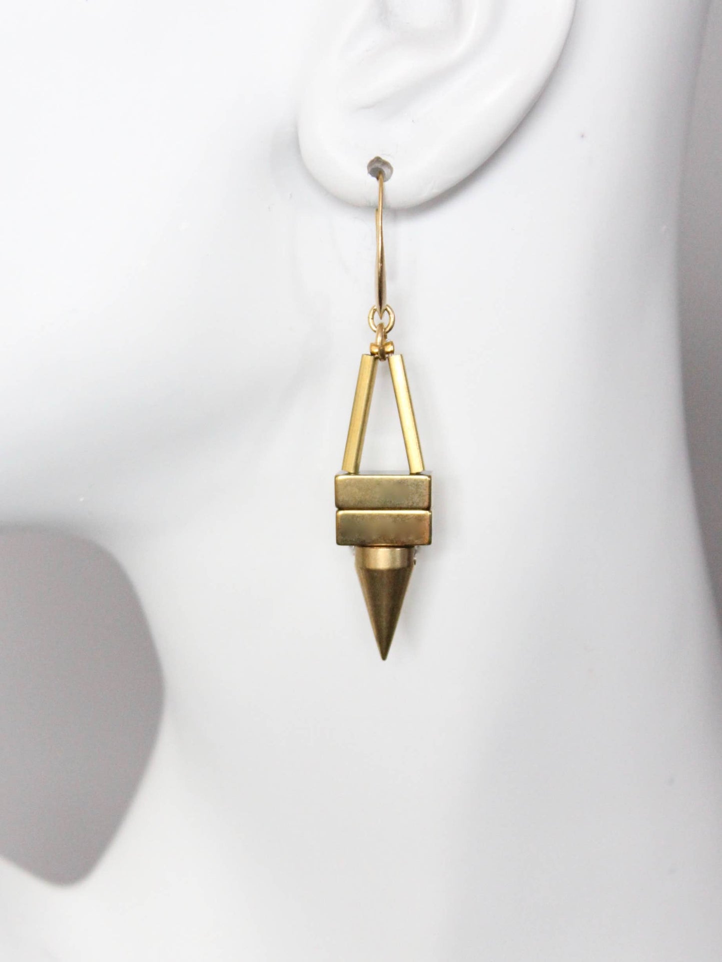 Geometric hematite and brass spike earrings