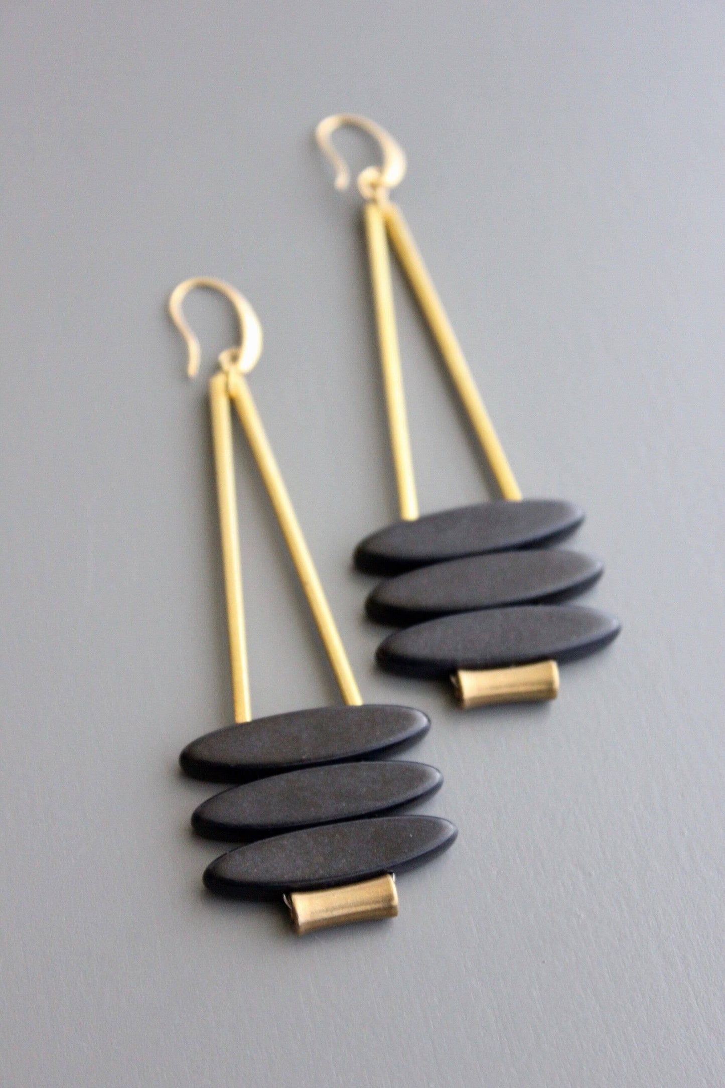 Geometric black stone ellipse earrings