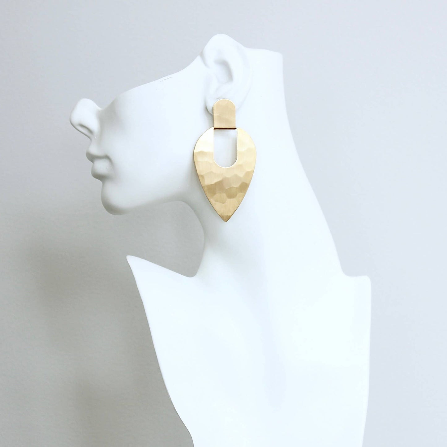 Geometric hammered brass post earrings