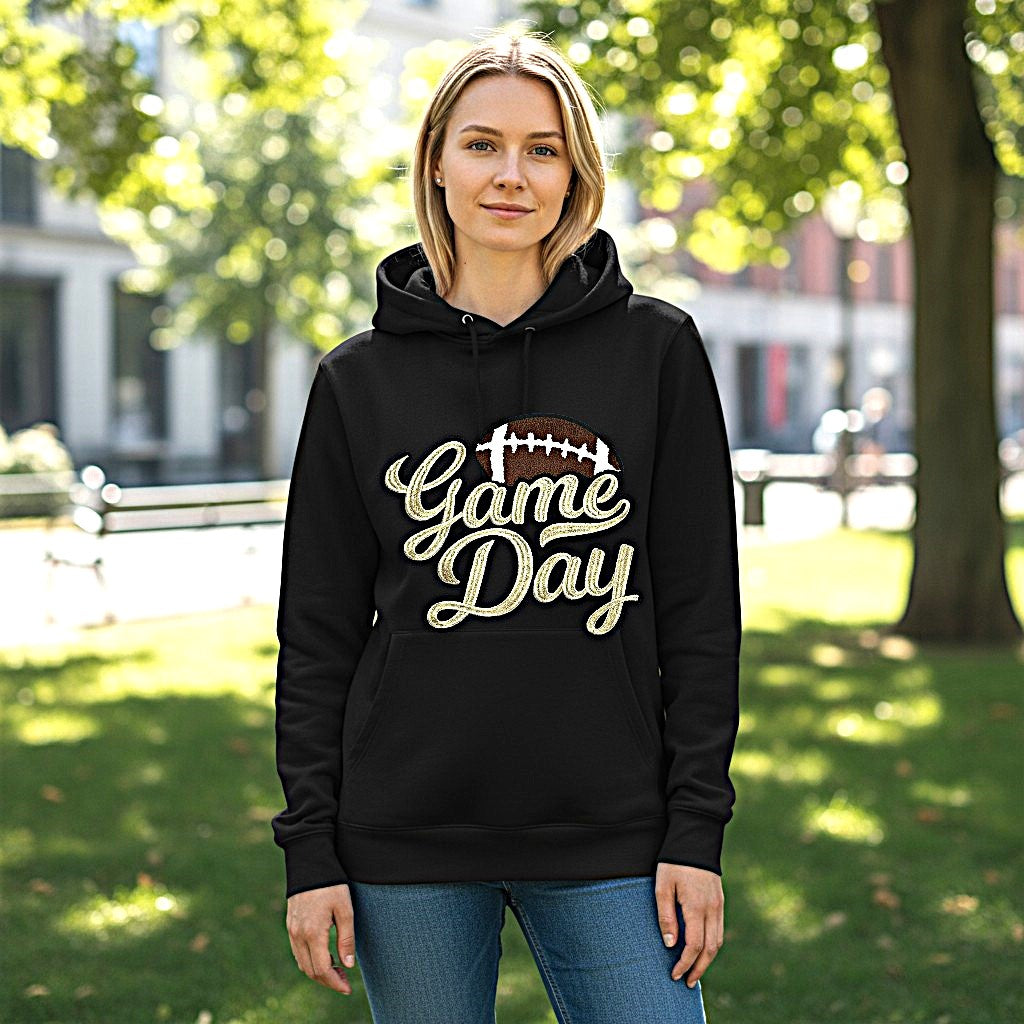 Gold Metallic Game Day Patch on Black Hoodie